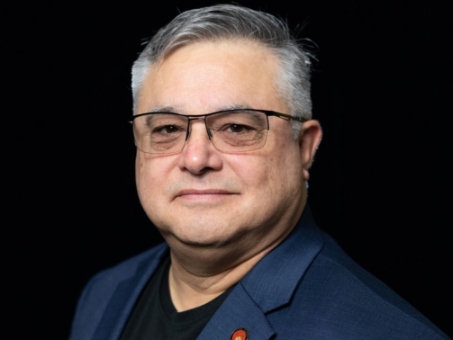 John Vela Headshot_3_2022_featured