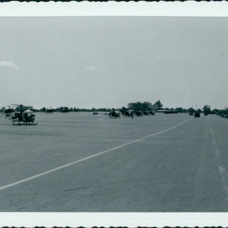 Postcard by Martin (Marty) Gronborg - date unknown - RWQC Flt. Line - OH-13E in front